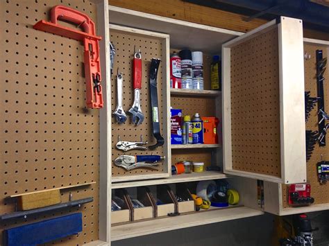 steel wall cabinet and pegboard|pull out pegboard cabinet.